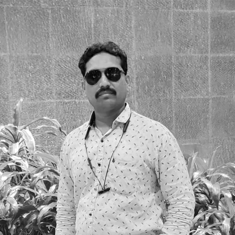 Kanubhai portrait team member at Thumb Impressions