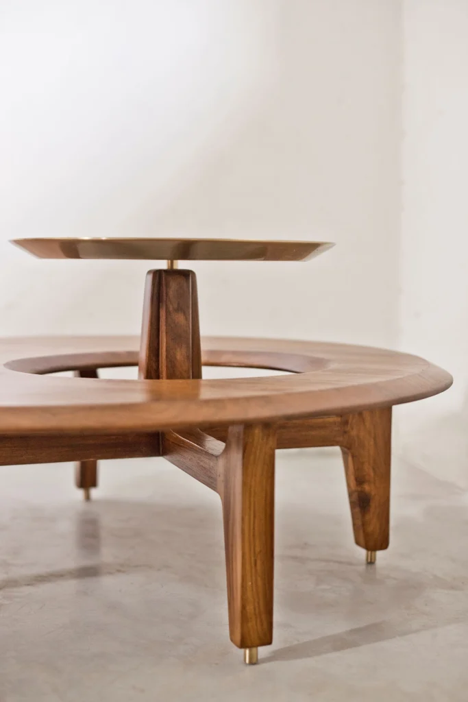 Close-up view of the polished brass tabletop texture and craftsmanship
