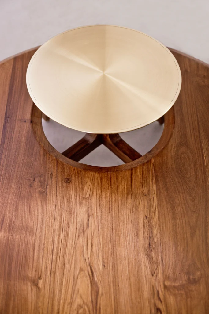 Detail shot of the metallic finish on the brass top table