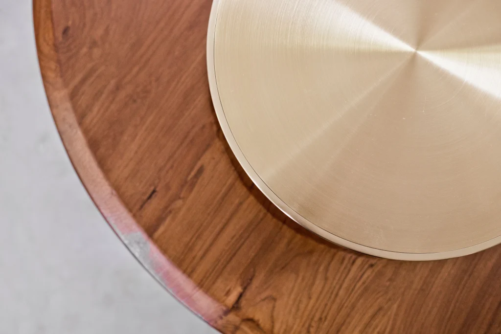 Full view of the brass top table showcasing its overall structure and design