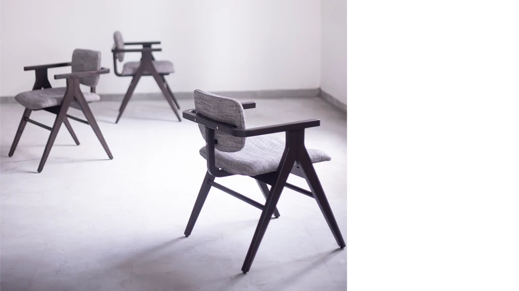 Elegant wooden dining chair featured in modern dining room setting