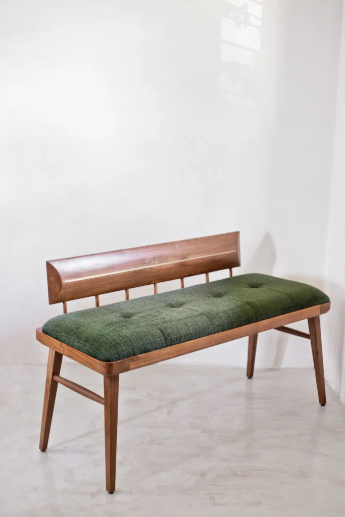 Close up view of the Ellipse Bench wooden texture