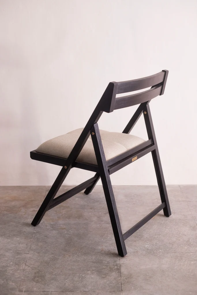 Close up view of folding chair craftsmanship and finish