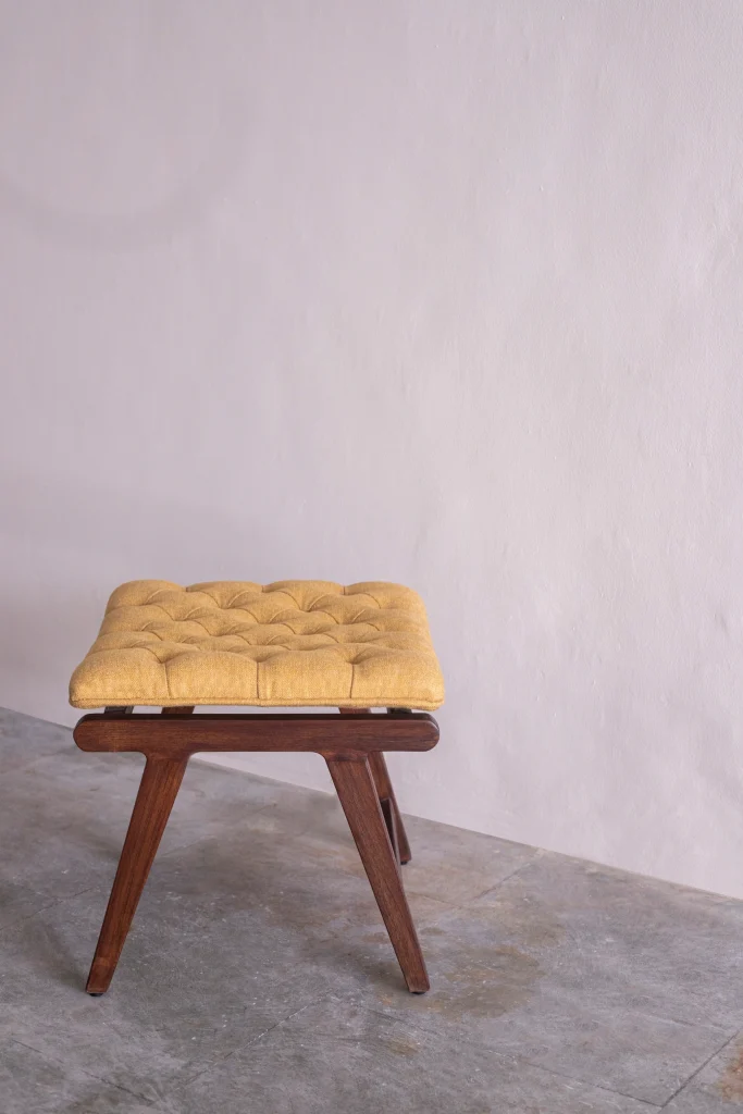 Side angle view of the Levitated Pouffe furniture piece