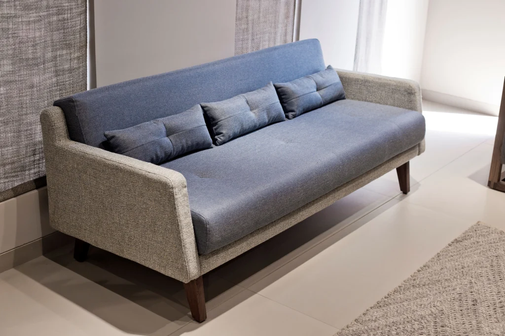 Side angle view of the luxury dual fabric sofa living room setup