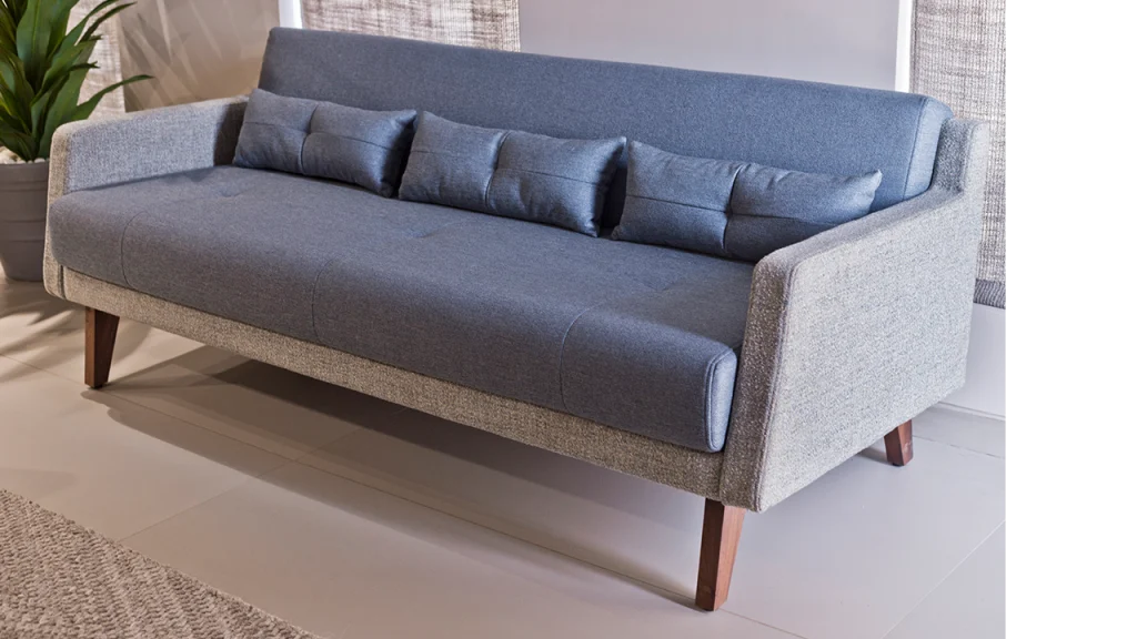 Modern dual fabric sofa design showcasing texture and color contrast