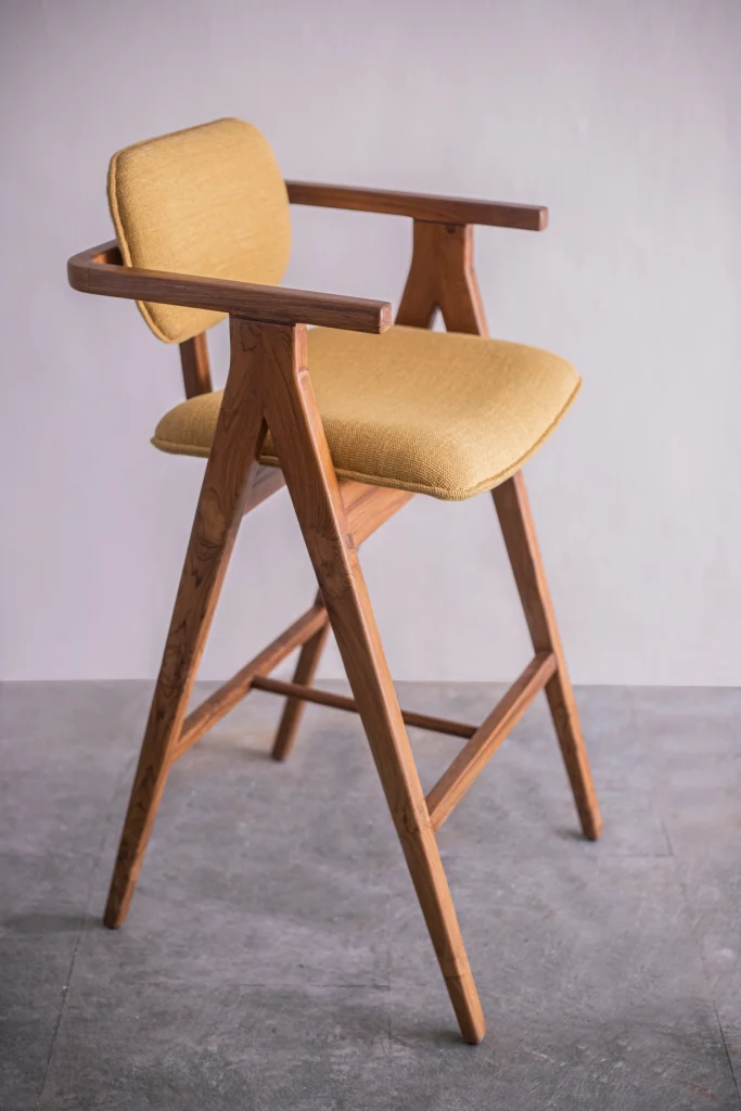 Side view of a stylish bar chair showcasing craftsmanship