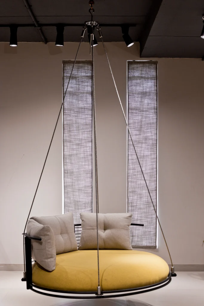 Decorative seating feature of the unique circular swing